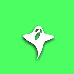 a white ghost face on a green background