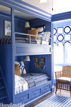 blue bunk beds with built - in desks are the perfect color combo for any child's bedroom