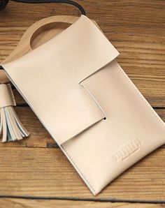 Overview: Design: Cute LEATHER WOMEN Cell Phone SHOULDER BAG Small Crossbody Purses FOR WOMENIn Stock: 3-5 days For MakingInclude: A Shoulder BagCustom: NoLeather: CowhideMeasures: L 21cm x W 14.5cm x H 2cm / L 7.5cm x W 1cm x H 2cm Weight: 0.43 kgSlots: 1 main slot, 1 inner slot,Accessories(option): NoneStyle: Cute LEATHER WOMEN Cell Phone SHOULDER BAG Small Crossbody Purses FOR WOMENVery durable (At least 5 Years) and it should last a life time Description: The Cute Leather Women Cell Phone Shoulder Bag is a delightful and practical accessory, perfect for women who value both style and convenience. Handmade with meticulous attention to detail, this charming crossbody purse is designed to carry your cellphone and other small essentials, making it ideal for those occasions when you prefer Crossbody Phone Purse, Overview Design, Bow Bag, Purses For Women, Small Crossbody Purse, Black Leather Purse, Leather Projects, Leather Bags Handmade, Felt Bag