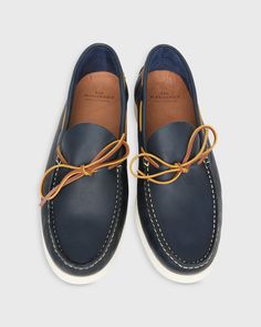 Camp Moccasin in Navy Leather | Shop Sid Mashburn Leather Lace-up Moccasins With Vibram Sole, Leather Lace-up Loafers With Vibram Sole, Classic Boat Shoes With Vibram Sole, Rubber Sole Moc Toe Loafers For Boating, Moc Toe Loafers With Rubber Sole For Boating, Moc Toe Leather Shoes With Contrast Sole, Leather Moc Toe Moccasins, Leather Moccasins With Rubber Sole And Moc Toe, Casual Moc Toe Loafers With Vibram Sole