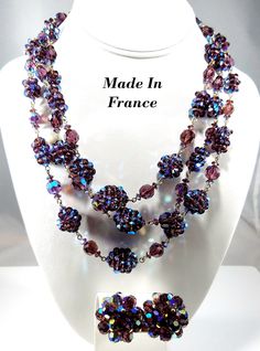 "*Description: Exquisite vintage \"Made in France\" aurora borealis purple with blue reflections, crystal wire wrapped necklace and clip on earrings, with AB rhinestone brass hook clasp; would add a gorgeous necklace set to any special occasion or collection, from the 1950s.  This is one of the most beautiful necklace sets (demi-parure) in our collection.  Our favorite color is purple (which is why it was originally purchased) and with the Aurora Borealis Purple  beads, which have been wire wrap Crystal Necklace Designs, French Purple, Wrapped Necklace, Crystal Bead Necklace, Cluster Necklace, Purple Crystal, Pink Necklace, Wire Wrapped Necklace, Purple Crystals