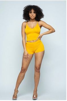 I am the CEO of King her Boutique. I sell various items including lashes, clothes, and accessories.✨ This is the plain Jane two piece set. The set includes a crop top and shorts. The crop top has a v cut neckline and adjustable spaghetti straps. The shorts are mini length with an elastic waistband. The material is soft and stretchy and the sizes range from small to large. It comes in yellow, green, and gray. These sets do run small. Message me for any questions. Seamless Short Length Crop Top For Summer, Trendy Spaghetti Straps Crop Top For Loungewear, Trendy Short Crop Top, Trendy Short Crop Top For Vacation, Trendy Short Crop Top For Loungewear, Trendy Short Length Crop Top For Loungewear, Trendy Loungewear Crop Top, Trendy Seamless Shorts, Black Glamour