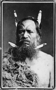 an old photo of a man with horns on his head