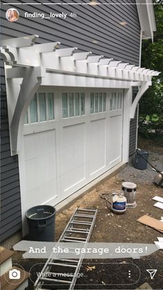 the garage door is open and there is a ladder in front of it that has been installed