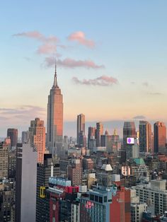 the skyline of new york city at sunset