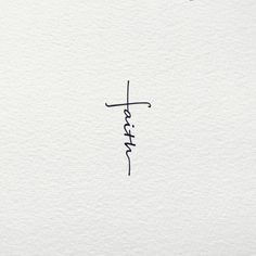 the word faith written in cursive ink on white paper