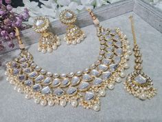 Gold Kundan Statement Kundan Set contrasted with Pearls With Jhumkey Earrings and Tikka  Stunning for Nikkah, Bridal, Party etc White Chandbali Jewelry Sets For Eid, White Hand Set For Festivals, Festive White Jewelry Sets For Wedding, White Wedding Jewelry Sets For Festive Occasions, White Chandbali Jewelry Sets For Wedding, White Jhumkas For Wedding, Bollywood Style White Jewelry Sets For Eid, White Bollywood Jewelry Sets For Party, White Temple Jewelry Set For Party