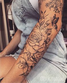 a woman's arm with flowers and butterflies tattooed on her left arm, next to the words new posts