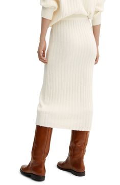 Sumptuous and stretchy, this midi-length sweater-skirt knit with soft ribbing will be the one you reach for when temperatures dip. Pull-on style Unlined 50% acrylic, 44% polyester, 5% wool, 1% elastane Hand wash, line dry Imported Mango Skirts, Midi Sweater Skirt, Skirt Knit, Be The One, Cream Sweater, Sweater Skirt, Midi Length, Dip, The One