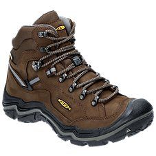 A boot that delivers durable support and traction over rough terrain, the KEEN\u00ae Durand II Mid Waterproof Hiking Boots for Men help you explore farther. Premium, waterproof nubuck leather uppers with KEEN.DRY waterproof/breathable membrane technology inside keep feet dry, supported, and protected. Breathable mesh linings allow air movement around the feet, while the boot's natural probiotic odor-resistant technology help keep feet feeling fresh. Stability shanks and contoured heel locks prov Rugged Hiking Boots With Foot Protection For Sports, Rugged Waterproof Boots With Round Toe For Climbing, Rugged Lace-up Hiking Boots With Protective Feet, Reinforced Toe Hiking Boots For Climbing, Waterproof Leather Hiking Boots For Climbing, Hiking Boots With Reinforced Toe For Climbing, Leather Waterproof Hiking Boots For Climbing, Leather Waterproof Boots With Reinforced Toe For Climbing, Waterproof High-top Hiking Boots For Climbing