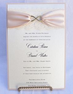 the wedding card is being displayed on an iphone