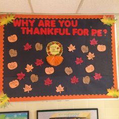 a bulletin board that says, why are you grateful for pe? with fall leaves on it