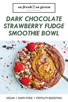 chocolate strawberry fudge smoothie bowl with raspberries on top