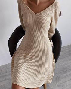 Knitted Long Sleeve V-Neck Sweater Dress Elegant Stretch V-neck Sweater, Cream Fitted V-neck Sweater Dress, Chic V-neck Sweater Dress For Winter, Ribbed V-neck Sweater Dress For Spring, Winter Stretch V-neck Dress, Elegant Stretch Ribbed V-neck Sweater, Chic Knitted V-neck Sweater Dress, Fitted Knitted V-neck Sweater, Chic Knitted V-neck Dresses