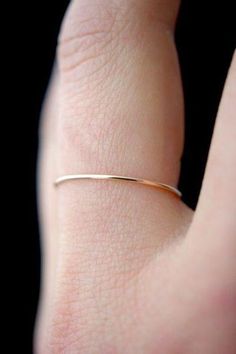 Ultra thin smooth stacking ring in rose gold. Available in 14k gold fill, sterling silver and 14k rose gold fill. Handmade in Portland, OR. PIPE AND ROW Seattle Shopping, Stacking Jewelry, Handmade Pipe, Handmade Gold Jewellery, Rings Gold, Knuckle Rings, Gold Ring Stack, Ring Rose Gold, Stacked Jewelry