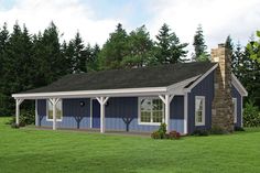 a small blue and white house sitting on top of a lush green field