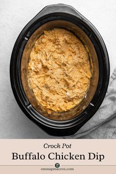 the crock pot buffalo chicken dip is ready to be cooked in the slow cooker