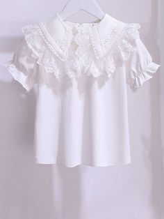 From tea parties to chic playdates, this lace collar ruffle blouse will make sure your little fashionista is always in style! Decorated with intricate lace details and pretty ruffle sleeves, it's guaranteed to impress. She'll look like the loveliest little lady! Breathable fabric offers maximum comfort, so she remains fresh even on warm days. She can stay prim and pretty while enjoying playdates, strolls, and more. Versatile style makes it easy to mix, match, and layer with other clothes. She'll have so much fun styling her 'fits! Perfect for fall, casual outfits, dressy ensembles, layering under blazers, and more Ruffle-sleeve blouse with lace collar detail Available in sizes 3T-12Y Imported: This item ships from our overseas fulfillment center. Once you see it, you will know it's worth t Peter Pan Collar Top, Fall Casual Outfits, Lace Short Sleeve Top, Outfits Dressy, Ruffle Sleeve Blouse, Lace Short, Nice Clothes, Girls Toddler