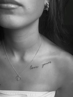 a woman's chest with the words love you written on it