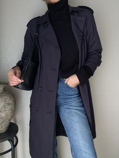 "This gorgeous vintage navy blue trench coat is a classic wardrobe staple. It is stylish and flattering timeless piece that features double breasted front buttons, two front pockets and a waist tie. This jacket is great for layering and will be a life-long item with versatility to carry you through all the seasons. No tag but feels like a cotton/poly blend Recommended for size S-M depending on desired drape & styling but please always refer to measurements as sizing can be subjective. Model is s Blue Trench Coat Aesthetic, Classic Double-breasted Spring Peacoat, Chic Navy Double-breasted Peacoat, Classic Spring Peacoat With Button Closure, Classic Navy Peacoat For Spring, Classic Double-breasted Peacoat, Classic Spring Workwear Peacoat, Classic Spring Peacoat For Workwear, Vintage Peacoat For Fall Workwear