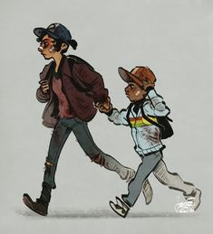 two young boys are running and holding hands