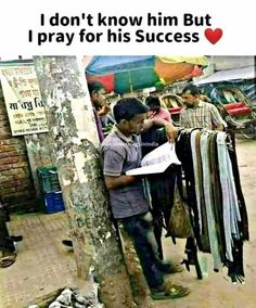 a man standing next to a tree with clothes hanging on it's sides and the words, i don't know him but pray for his success