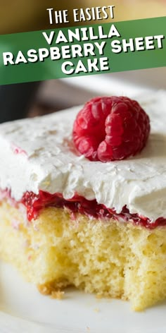 a close up of a piece of cake on a plate with raspberry topping