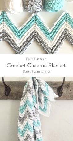 crochet chevron blanket hanging on a wall with yarn balls in the background