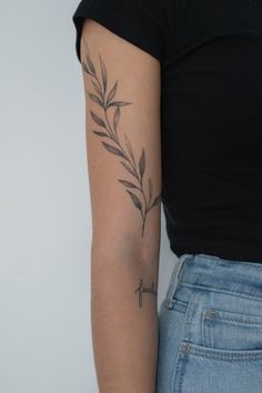 Women with arm tattoo. Olive branch covering the top half of arm. Black and white. Patch sleeve style Women Patch Sleeve Tattoo, Olive Branch Around Arm Tattoo, Thick Leg Tattoo, Vine And The Branches Tattoo, Olive Branch Scripture Tattoo, Arm Branch Tattoo, Italian Ruscus Tattoo, 3in Tattoo Ideas, Olive Branch Tattoo Sleeve