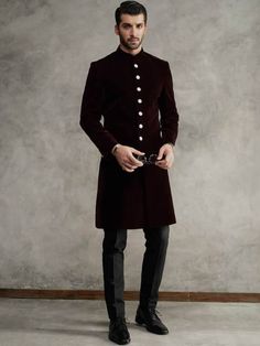 <p><strong>Sherwani:</strong><br />Color: Maroon<br />Fabric: Velvet<br />Premium Plain velvet sherwani<br />Fancy button closure</p> <p><strong>Inner:</strong><br />Complement with black kurta and pants</p> <p><br /><br /><strong>Additional Accessories:</strong> <br /><strong>Kolhapuri/Saleem Shahi shoes:</strong> US$30 (Made with sherwani material & embroidery) <br /><strong>Tied pre-made Turban:</strong> US$150 <br /><strong>Men's Plain Shawl:</strong> US$50</p> <p><strong>Note:</strong> The Maroon Sherwani, Velvet Sherwani, Sherwani Wedding, Kurta And Pants, Indo Western Sherwani, Groom Sherwani, Sherwani Groom, Black Kurta, Wedding Sherwani