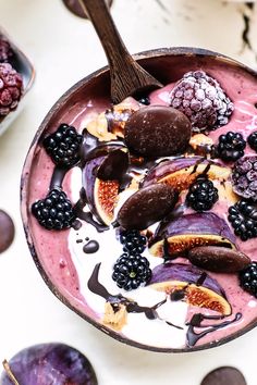 a bowl filled with fruit and ice cream