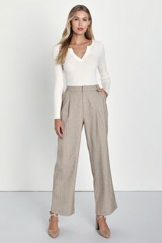 Everyone will take notice when you walk in wearing the Lulus Professionally Posh Beige and White Pinstriped Wide-Leg Pants! Midweight woven fabric, with pinstripes throughout, shapes these pants that have a high waist, belt loops, and front diagonal pockets. Back boasts two decorative welt pockets, atop wide legs that fall to ankle-grazing hems. Hidden zip fly with top clasp closure. Fit: This garment fits true to size. Length: Ankle length. Size medium Inseam: 29.00 Front Rise: 13.00 Waist: Fit White Wide Leg Pants Outfit, Dressy Pants Outfits, Low Waisted Pants, Wide Leg Pants Outfit, White Wide Leg Pants, Lulu Fashion, Work Outfits Women, Low Waisted, Wide Legs