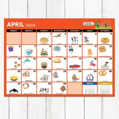 an orange and white calendar with images of animals, cats, and other things on it