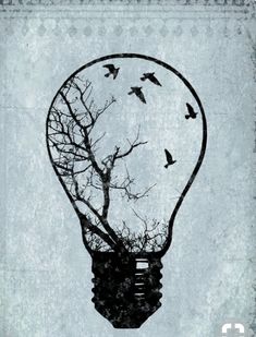 a light bulb with birds flying around it and trees in the shape of a tree