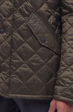 Box-quilted nylon protects from sudden storms without weighing you down on this lightweight insulated jacket that's understated yet edgy. 30" length (size Medium) Front two-way zip closure with snap storm flap Stand collar Front zip and snap-flap pockets Lined, with polyester fill 100% polyamide Dry clean or machine wash, dry flat Imported Winter Diamond Quilted Outerwear For Outdoor, Diamond Quilted Outerwear For Winter Outdoor Activities, Diamond Quilted Outerwear For Outdoor Winter, Winter Outdoor Diamond Quilted Outerwear, Fall Outdoor Outerwear With Diamond Quilting, Barbour Quilted Jacket, Olive Jacket, Barbour Jacket, Navy Jacket