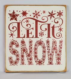 a red and white sign that says it's snow on the outside, surrounded by snowflakes