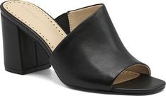 Modern Open Toe Mules With 4-inch Heel, Formal Open Toe Mules With 4-inch Heel, Chic Sandals With Stacked Heel For Office, Modern Slip-on Mules With Heel Loop, Modern Mules With Block Heel And Heel Loop, Chic Formal Slip-on Sandals, Classic Open Heel Mules With Wrapped Heel, Chic Slip-on Sandals For Formal Occasions, Chic Almond Toe Office Sandals