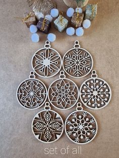 a set of six ornaments sitting on top of a table