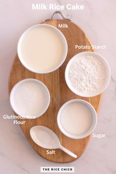 ingredients to make milk cake sitting on a wooden board with text overlay that says milk cake