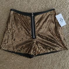 Gold Zipped Sequin Shorts Size M Fitted Shorts With Zipper Closure For Spring, Fitted High Waist Shorts With Zipper Closure, High Waist Fitted Shorts With Zipper Closure, Fitted Summer Bottoms With Zipper Closure, Casual Party Bottoms With Zipper Closure, Fitted Bottoms With Zipper Closure For Summer, Stretch Party Bottoms With Zip Fly, Stretch High Waist Shorts With Zipper Closure, Fitted Summer Shorts With Zipper Closure