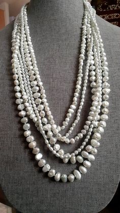 6 strand freshwater Pearl necklace. Adjusts from 28-34". Sterling silver hook clasp Pearl White Multi-strand Beaded Necklace, White Multi-strand Pearl Necklace, Pale Mint Green, Flagstaff Az, Freshwater Pearl Necklace, Hook Clasp, Freshwater Pearl Necklaces, Multi Strand Necklace, Strand Necklace