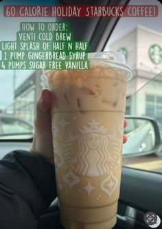 someone is holding up a starbucks drink in their car with instructions on how to order