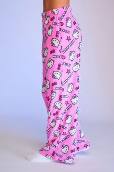 From our Hello Kitty and Friends x Forever 21 collection, this pair of fleece pajama pants features an elasticized waist, allover "Hello Kitty" text and Hello Kitty character, star, bow, and heart graphics, on - seam pockets, and wide leg. | © 2022 SANRIO CO., LTD. Used Under License. | 100% polyester | Hand wash cold | Model is 5'6" and wearing a Small | Inseam: 28" | Hello Kitty & Friends Hello Kitty Pajama Pants Shop styles similar to Shein, Fashion Nova, ASOS, Old Navy, H&M, LightInTheBox, C Hello Kitty Pajama Pants, Hello Kitty Pants, Muzică Rock, Kitty Clothes, Hello Kitty Clothes, Hello Kitty Friends, Hello Kitty Characters