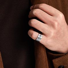 Our men's engraved ring is a timeless accessory that suits any man's style. Its sleek and modern design makes it perfect for all occasions, from formal to casual events. Customize it with a name, initials, or a special message to make it a unique and thoughtful gift for birthdays, graduations, or Father's Day. Made from high-quality materials, it's built to last and will withstand everyday wear and tear. The ring is available in a range of sizes to fit any finger, making it an ideal gift for men of all ages. With its superior quality and stunning design, our men's engraved ring is a must-have accessory for any man who values style and quality. Modern Engraved Open Initial Ring, Modern Wide Band Promise Ring, Modern Promise Ring With Engraving, Engraved Signet Ring For Father's Day, Modern Stainless Steel Signet Ring For Anniversary, Modern Stainless Steel Signet Ring, Grandma Ring, Sister Ring, Father's Day Gift: Polished Signet Ring