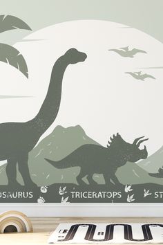 an image of dinosaurs in the wild with trees and mountains behind them wall decal