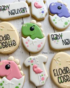 decorated baby shower cookies on a table