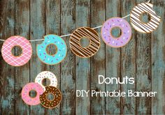 donuts are hanging on a string with the words do nuts diy printable banner