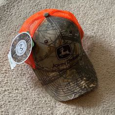 John Deere Trucker Hat / Ball Cap / Baseball Cap Realtree Camo With Bright Orange Back. Never Been Worn. John Deere Accessories, John Deere Hats, Camo Trucker Hat, Orange Camo, Camo Hats, Realtree Camo, Mesh Hat, Strapback Hats, Mens Green