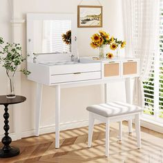 a white dressing table with sunflowers on it