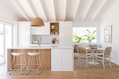 the kitchen is clean and ready to be used as a dining room or living area